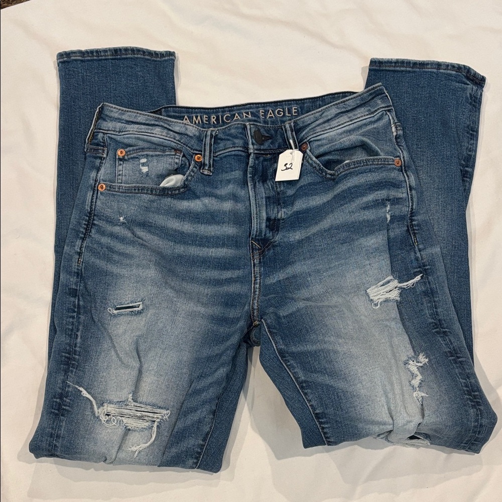 American Eagle Outfitters Airflex+ Athletic Fit Light Blue Ripped Skinny Jeans